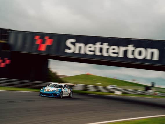 Will Martin crosses the line at Snetterton / Pictures: Dan Bathie / Porsche GB
