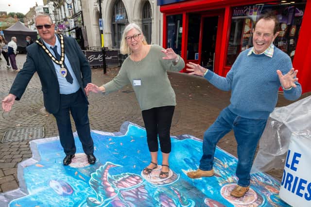 Littlehampton Town Council which has installed two pieces of 3D art in Littlehampton’s High Street in October as part of the town council and Arun District Council’s jointly funded town centre events initiative. Left to right: town mayor David Chace, councillor Dr James Walsh and Jill Long.