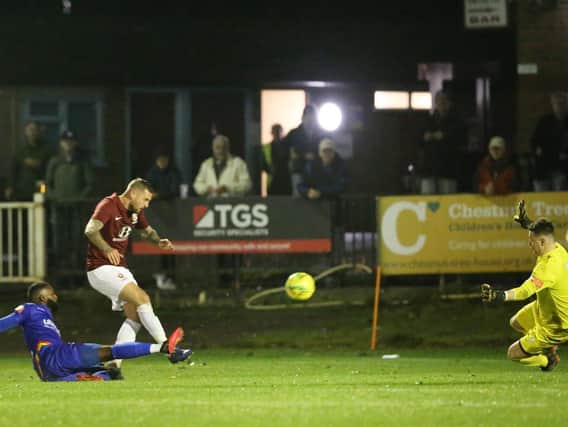 Kenny Pogue opens the scoring / Picture: Scott White