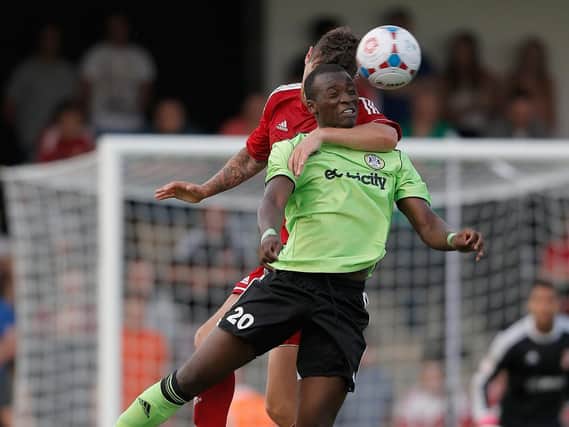 Omar Koroma gets a spot of manhandling from a Swindon opponent while with Forest Green / Picture: Getty