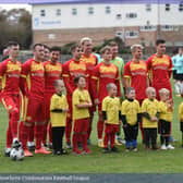 Newhaven line up with their mascots before a recent home game / Picture: Chris Gregory