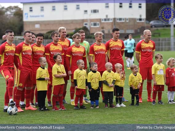 Newhaven line up with their mascots before a recent home game / Picture: Chris Gregory