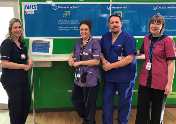 West Sussex staff with the eTriage technology