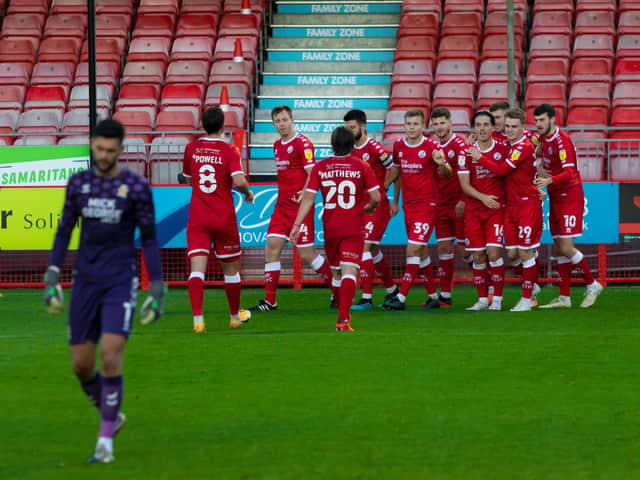 Reds celebrate Tom Nichols' winner. Picture by Jamie Evans Photography