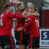 Eastbourne Borough celebrate a goal in their 2-1 win over Welling - and they look like being one of the lucky ones allowed to carry on playing / Picture: Andy Pelling