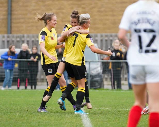 Goalscorer Emma Plewa (number 7) is congratulated by Nikita Whinnett (Picture: Ben Davidson Photography – www.bendavidsonphotography.com)