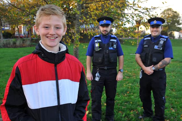 Kian Pontet-Piccolomini with police officers Constantin Maican and Pete Whitton. Photo: Steve Robards