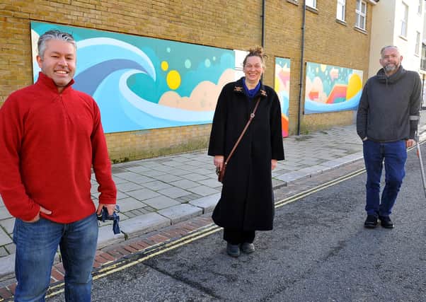 Local artist Ben Cavanagh with Heather Allen and Jason Passingham (Chairman of BID) alongside the artwork