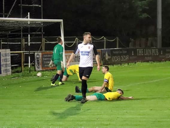 One of six - Pagham score against Hailsham / Picture: Roger Smith