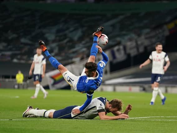Adam Lallana and Harry Kane tumble to the ground at the Tottenham Hotspur Stadium last Sunday