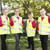 Some of the students in the hi-vis SUS-200411-162405001