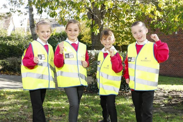 Some of the students in the hi-vis SUS-200411-162405001