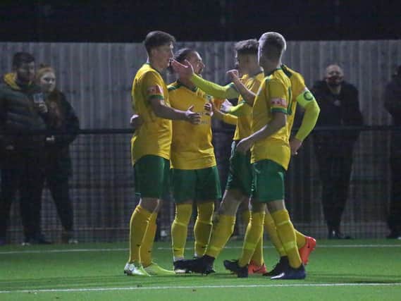 Horsham celebrate as they move into an early 2-0 lead v Carshalton on Tuesday night  / Picture: John Lines