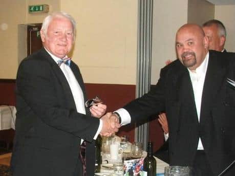 John Murray receiving his long service award from Gareth Chilcott, England & British Lions