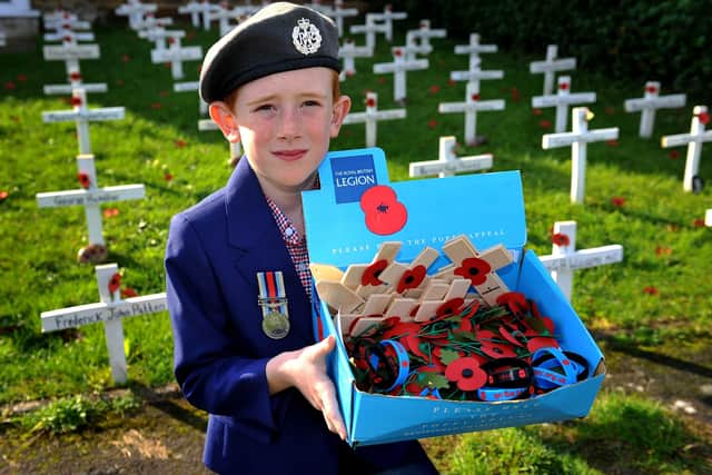 Arlan West by the Remembrance display in his Selsey garden