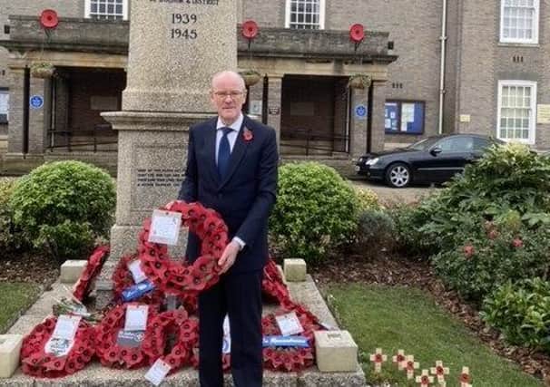Nick Gibb MP at the war memorial