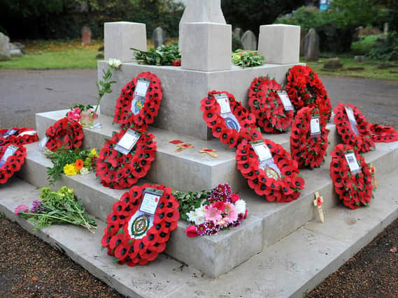Wreaths laid at the war memorial at St John's Church, Crawley. Pic Steve Robards SR2011092