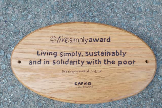 The Live Simply award given to  St John’s Catholic church in Horsham SUS-201011-135107001