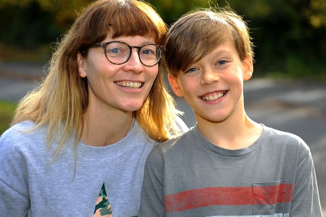 Lucas from Midhurst raised money for an adoption charity, pictured with his mum Cara. Pic Steve Robards SR2011102 SUS-201011-171034001