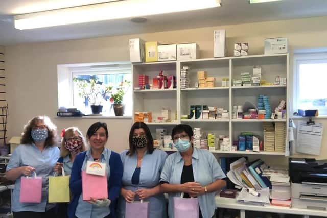 Staff at Procter Health Care Pharmacy in Polegate with their goodie bags