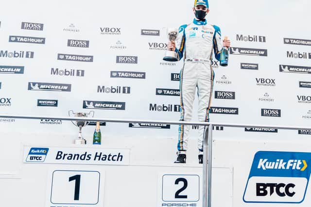Will Martin on the podium. Picture by Dan Bathie/Porsche GB.