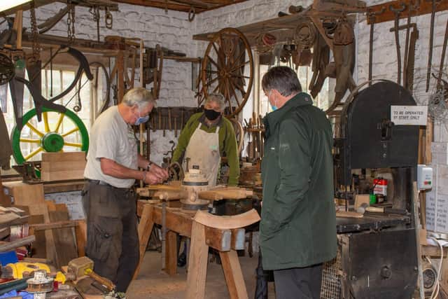 The High Sheriff in the wheelwrights shop with Bob Brotherhood, left, and John Clements. Picture: Pete Edgeler