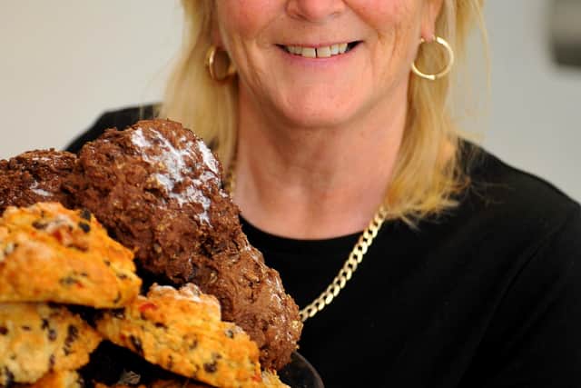 Karen Watling holding her famous rock cakes at Munchies in Burgess Hill. Photo by Steve Robards