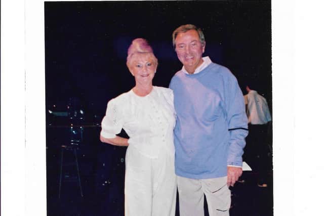 Des O'Connor with Dodie Tombs on board the QE11 in 2000