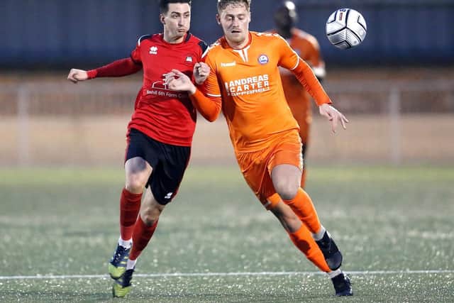 Greg Luer battles for the ball agai9inst Braintree Town on Saturday. Picture by Lydia Redman