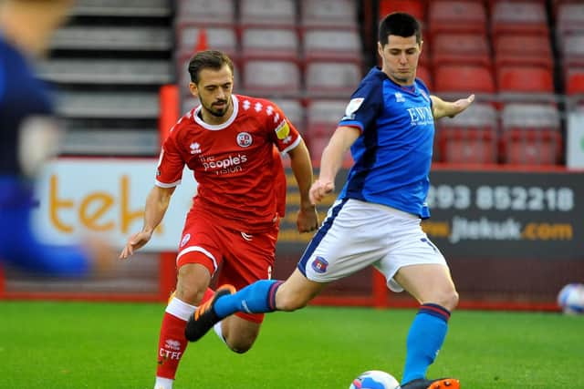 Jack Powell in action against Carlisle United