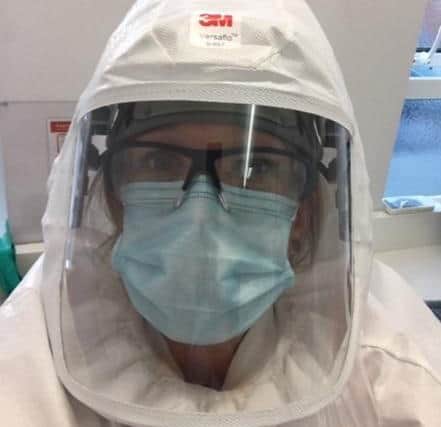 Jessica Barber, dental hygienist from Worthing, wearing full PPE