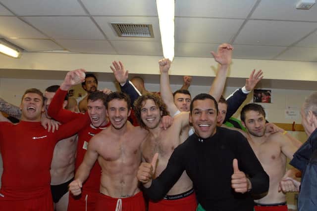 Crawley Town players after the Derby County win. Picture by Jon Rigby