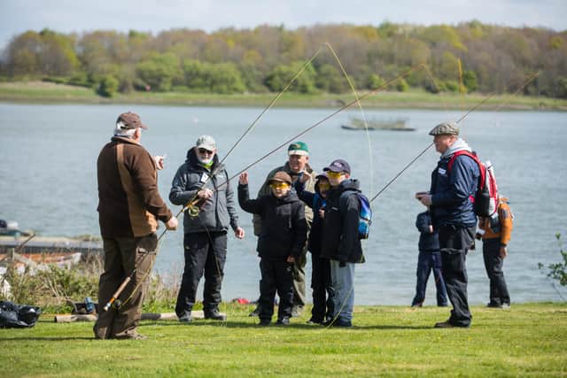 26/04/2017 - Ciaran McCrickard / South East Water - South East Waters Fishing and Rural Activities Day at Arlington Reservoir, with children from 6 local schools learning to hedge-lay, fly fish, tie flies, cook fish, draw, and pond dip. SUS-170405-070611001