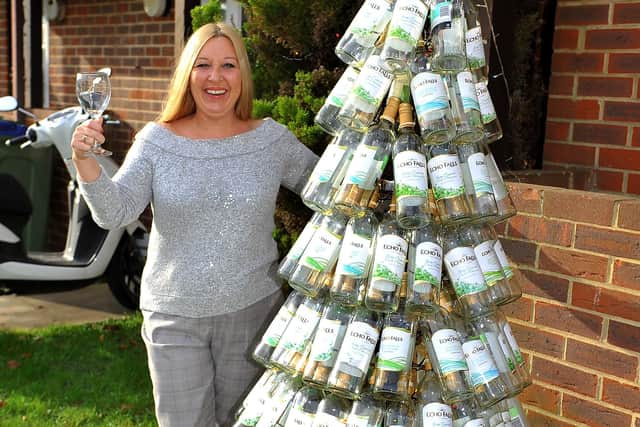 A Christmas tree made of bottles by Christine Aurelius goes viral. Pic Steve Robards