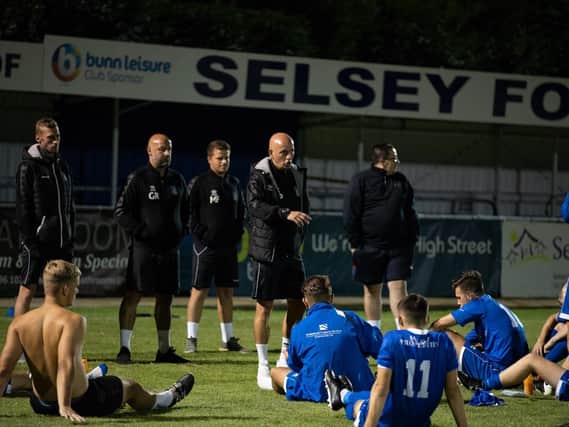 Daren Pearce talks to his Selsey players after a pre-season friendly against Bognor