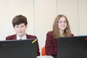 Students enjoying donated laptops