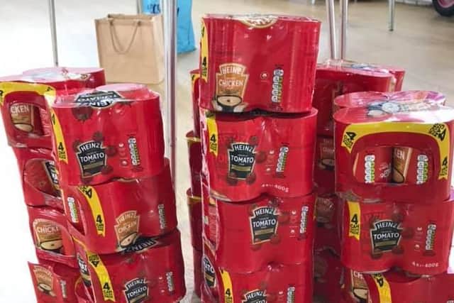 The club donated 100 cans of soup