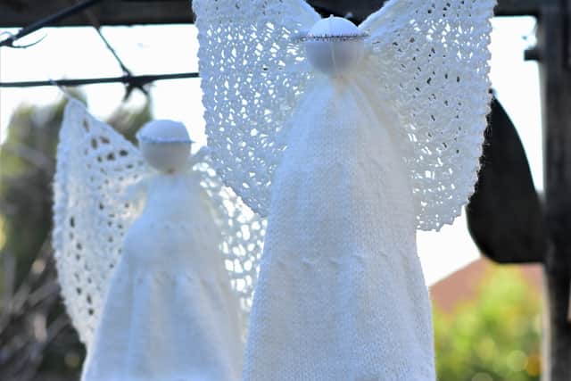 Some of the hand-knitted angels. Photo: Steve Dallas