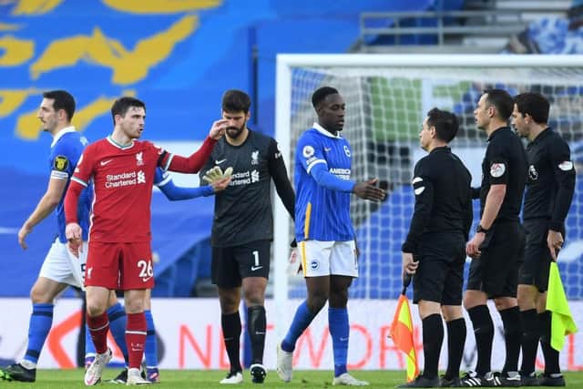 Liverpool's Andy Robertson was furious when a penalty was awarded against him for a foul on Brighton's Danny Welbeck