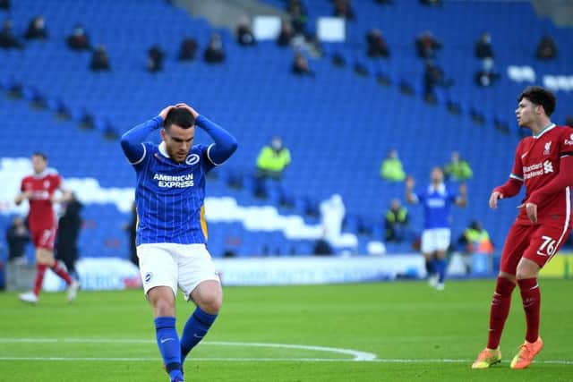 Brighton striker Aaron Connolly can't quite believe he missed a first half chance against Liverpool