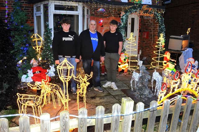 Wayne's two sons helped him set up the 'grotto'. Pic Steve Robards SR2012011