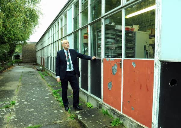Bishop Luffa Business manager Mark Nicholds looking at the building that needs replacing