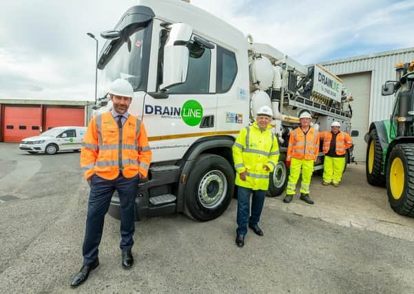 Pictured standing by a Super Recycler truck are (from left) Tristan Miles, managing director of Drainline Southern, Roger Elkins, West Sussex County Council Cabinet Member for Highways and Infrastructure, and Drainline Southern drainage engineers Christopher Faulks and Dean Smith