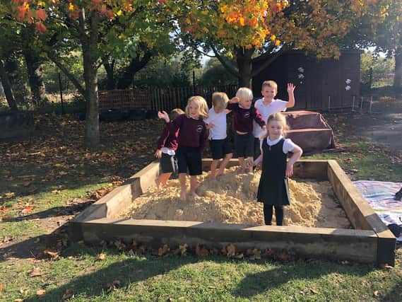 Fishbourne Primary School Pupils enjoying their new sandpit