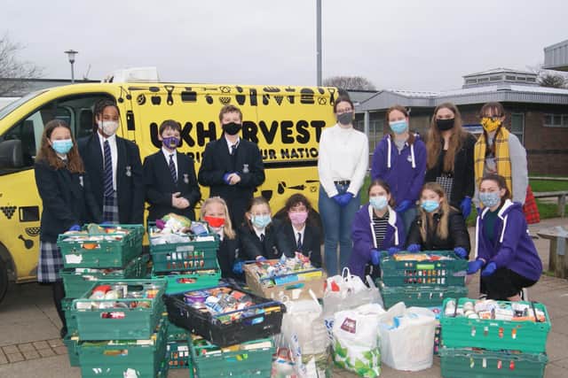 Year seven and sixth form students from Felpham Community College who co-ordinated the sorting of donations and helped with the collection