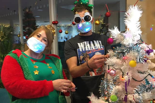 Staff at the YMCA Horsham Y Centre help residents get into the festive spirit