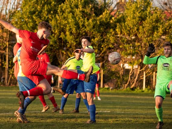 Action from St Francis Rangers' visit to Bosham / Pictures: Chris Hatton