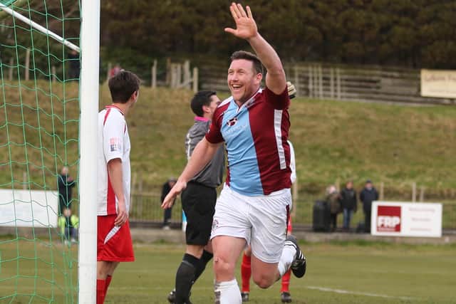 Sean Ray celebrates a goal for Hastings in 2016