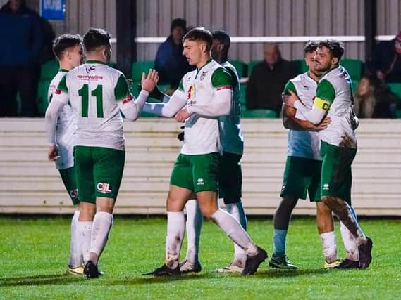 Bognor players celebrate after skipper Harvey Whyte, right, gives them the lead at Maldon / Picture: Lyn Phillips