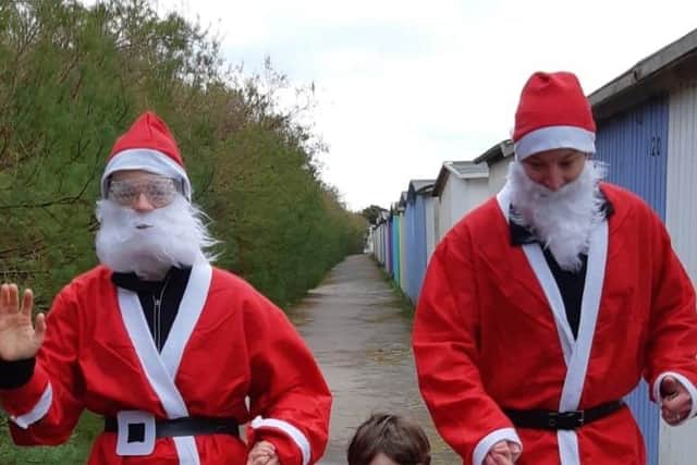 Chloe, Ned and Chris during their My Santa Run challenge for 4Sight